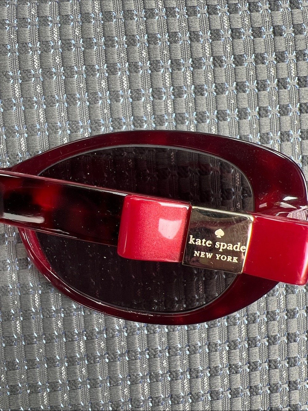 kate spade burgundy red tortoiseshell resin hair barrette with gold logo